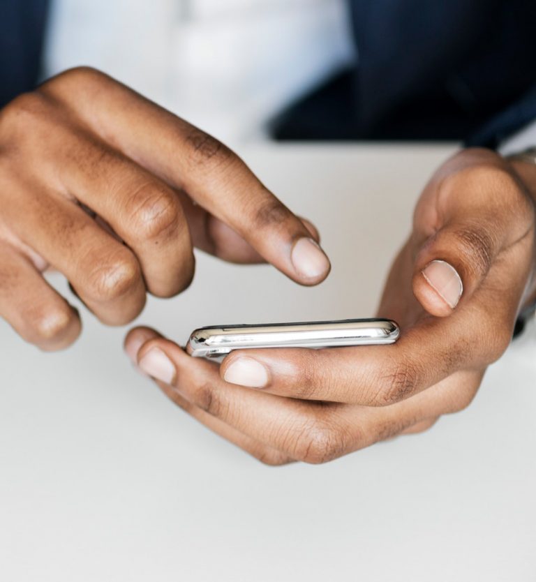 Man using a checklist on a phone